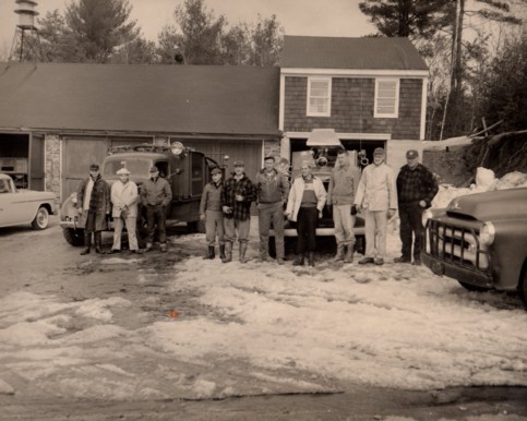 Volunteer Firefighters of the Holland Fire Department in front of the old fire station