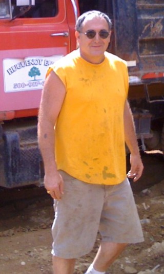 LaMountain in front of his Huguenot Farm truck