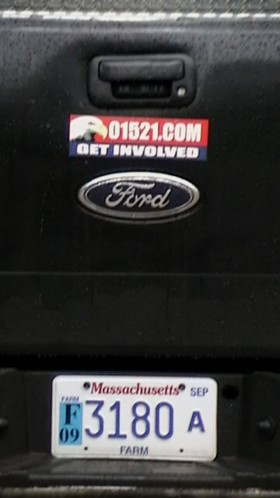 Farm license plate on James LaMountain‘s truck