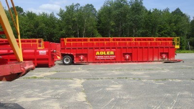 Adler hazardous waste tanks parked off Mashaupaug Road