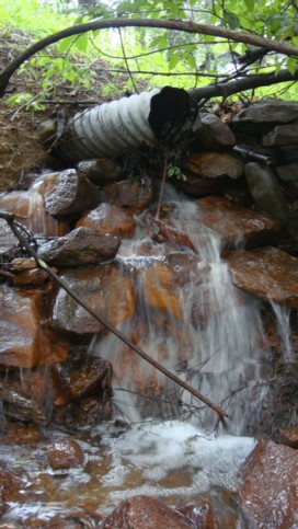 Another pipe that is not carrying any water. The water instead finds its way somewhere else and sooner or later will cause problems besides erosion.