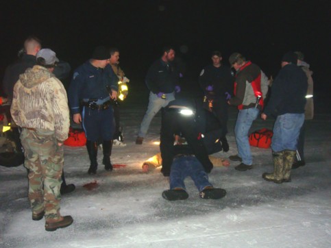 Howard Crow laying on the ice after the accident