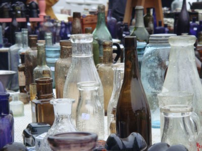 Display of antique bottles at J&J Auction Acres