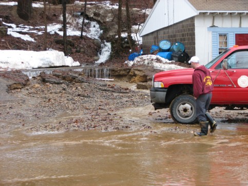 Water washed out the parking lot on the south side of PJ’s