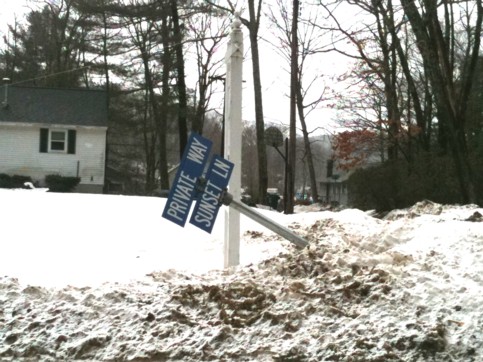 One of many bent street signs.