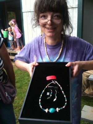 Elizabeth-with-her-necklace-donated-for-the-raffle