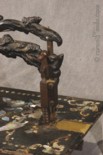 Antique figural Lady sewing machine