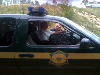 Two officers of the Environmental Police at the farm