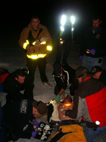EMT attending to the injured Howard Crow