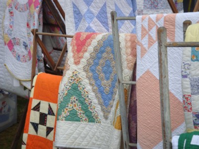 J&J Auction Acres, display of antique quilts.