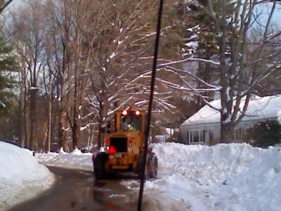 Heavy-Front-Loader-plowing-in-front-of-Earl-Johnson’s-house-on-Hisgen-Road.